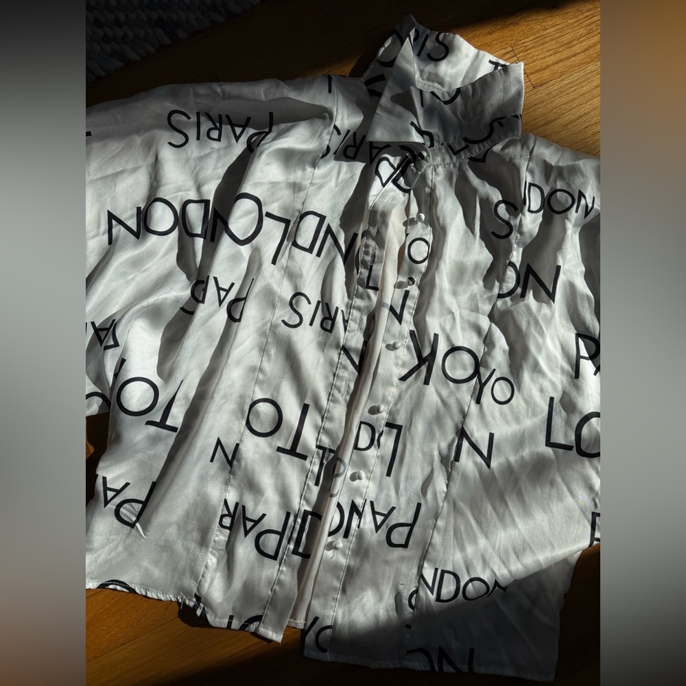 AKIRA White Button-Up Shirt with Black Text Print